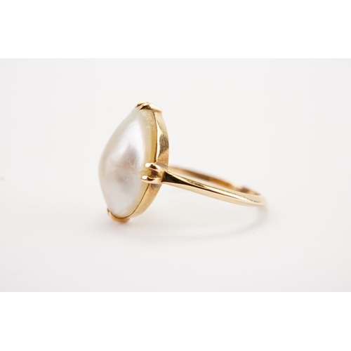 124 - A high carat gold pearl set ring, set with a large pearl, possibly from the Suwaidi farm. (No. 9).