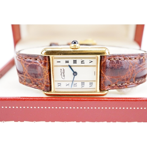 138 - A 1990's Cartier tank vermeil watch, marked 925, 20.5mm case size with Roman numerals. Quartz moveme... 