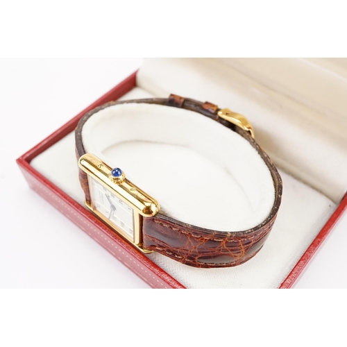 138 - A 1990's Cartier tank vermeil watch, marked 925, 20.5mm case size with Roman numerals. Quartz moveme... 