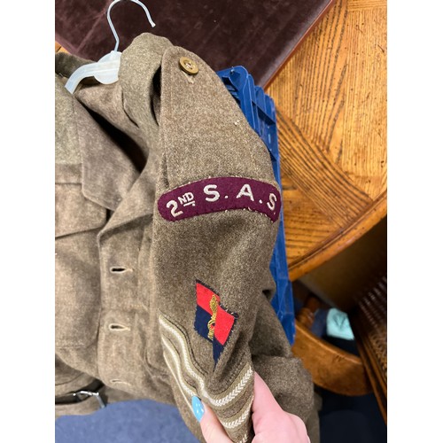 245 - A British WWII 2nd SAS Parachute Reg officers jacket and badges. Kings Crown War officer unit insign... 