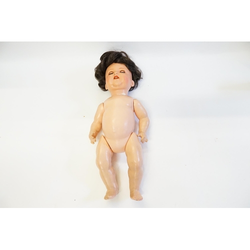 1096 - An A.M Koppelsdorf 996 bisque head baby doll, German circa 1915, with weighted blue glass eyes, open... 