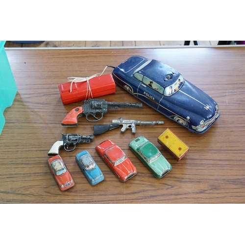 994 - A 1950s Tin Plate Remote Control Police Car in Blue. Measuring: 29cms, along with other tin plate mo... 