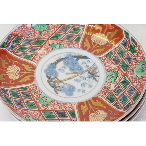 453 - A Set of 12 Imari Rust, Green & Gold Saucer Dishes.