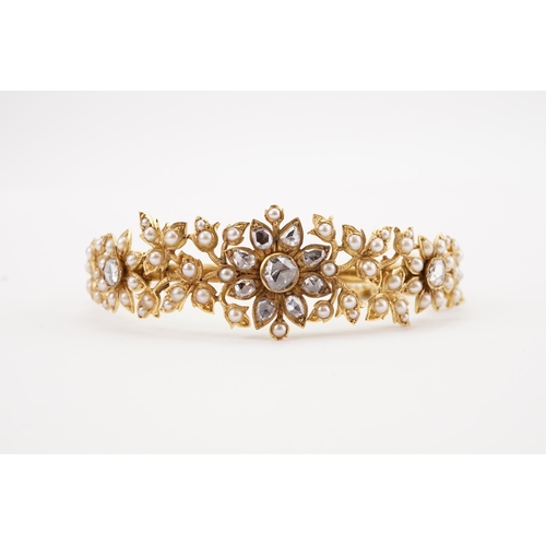 98 - A high carat gold rose cut diamond and seed pearl set bracelet, in a floral leaf design, safety chai... 