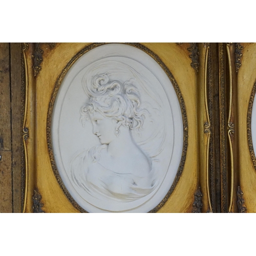 397 - A Pair of Marble Effect Oval Classical design & Gilt mounted Pictures. Measuring: 41cms x 53cms.