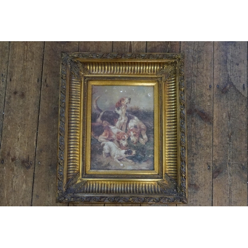 402 - A Print of a Group of Hunting Dogs in a heavy gilt frame. Measuring: 57cms x 67cms.