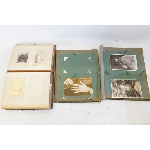 416 - A Victorian Photograph Album containing a collection of Family Portraits, Welsh Girls, etc along wit... 