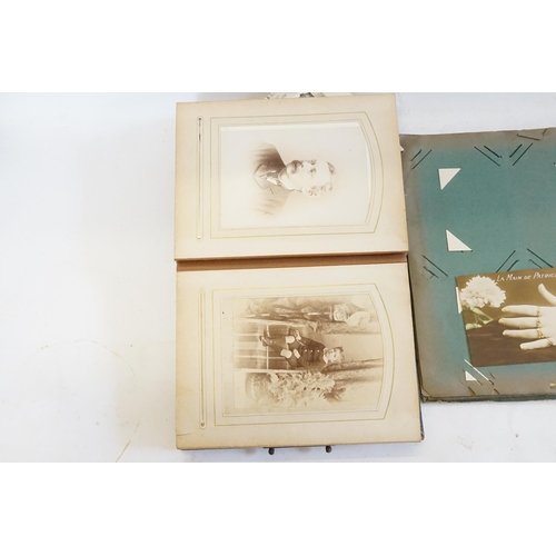 416 - A Victorian Photograph Album containing a collection of Family Portraits, Welsh Girls, etc along wit... 