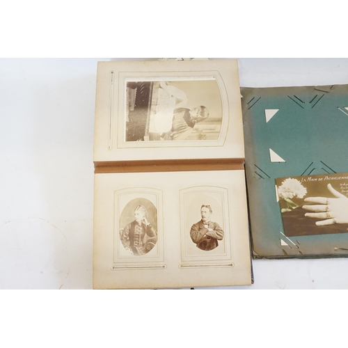 416 - A Victorian Photograph Album containing a collection of Family Portraits, Welsh Girls, etc along wit... 