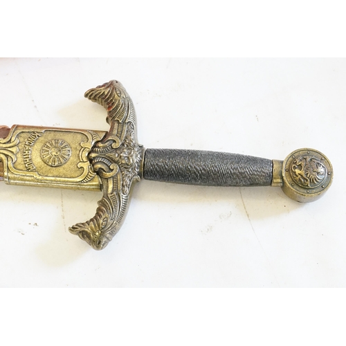 307 - A Reproduction King Arthur Sword, one other of Egyptian inspiration & a Royal Mail Paper Knife.