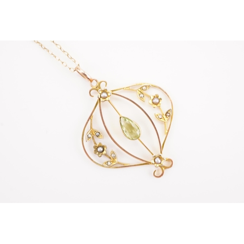 158 - A seed pearl and peridot set pendant, hung on a 9ct gold chain. Weight 2.9g.