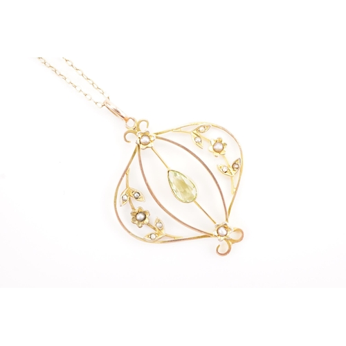 158 - A seed pearl and peridot set pendant, hung on a 9ct gold chain. Weight 2.9g.