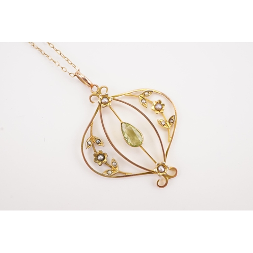 158 - A seed pearl and peridot set pendant, hung on a 9ct gold chain. Weight 2.9g.