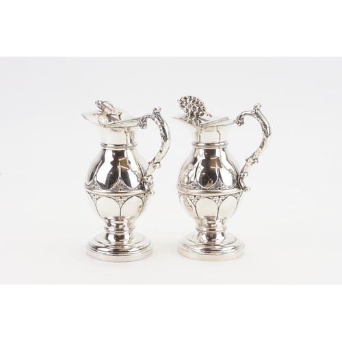 80 - A pair of silver plated miniature claret jugs, Circa 1920's.