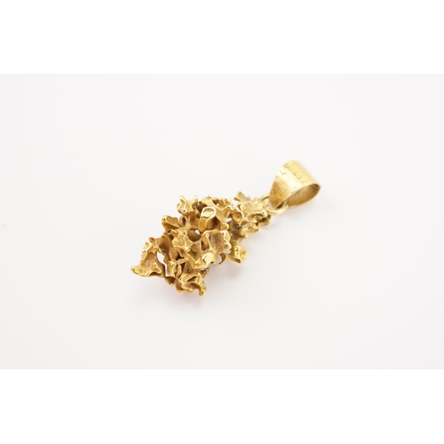 161 - A gold nugget pendant. Weight 4.5g.