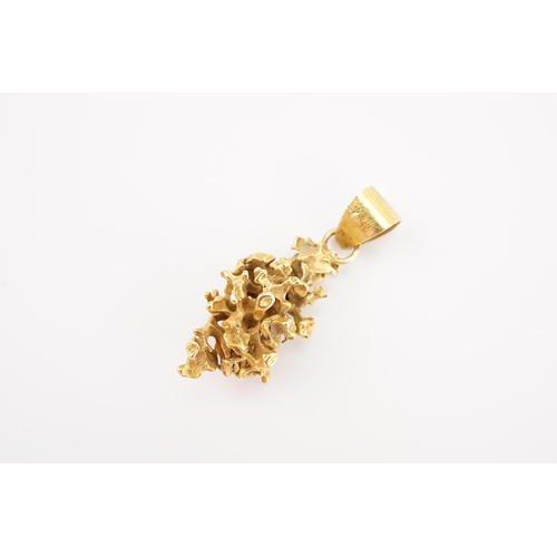 161 - A gold nugget pendant. Weight 4.5g.