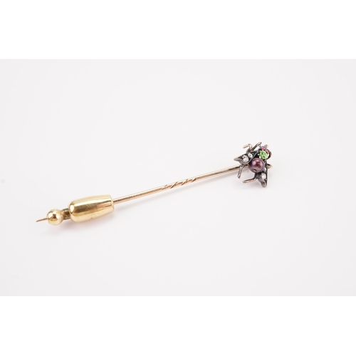 162 - A insect stick pin, set with diamonds and various gems. Weight 1.6g.