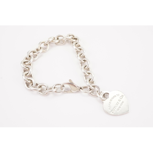 168 - The classic 2000 silver Tiffany & Co love heart bracelet. Weight 35g.