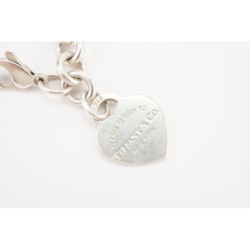 168 - The classic 2000 silver Tiffany & Co love heart bracelet. Weight 35g.