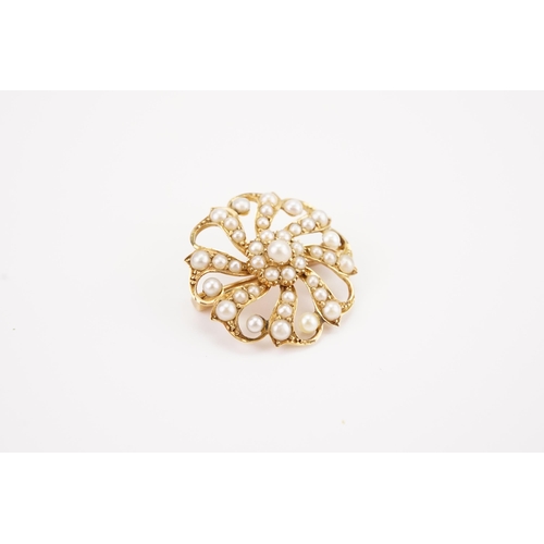 170 - A seed pearl set brooch, in a gold setting. Weight 3.3g.