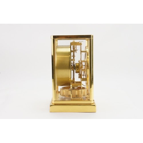 277 - A Circa 1970's Jaeger-LeCoultre gilt brass ATMOS mantle clock, REF 506919, white dial and gold numer... 