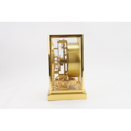 277 - A Circa 1970's Jaeger-LeCoultre gilt brass ATMOS mantle clock, REF 506919, white dial and gold numer... 