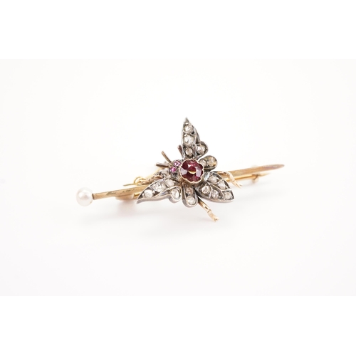 133 - A Victorian Diamond & Ruby Insect Brooch depicting a butterfly with Rose Cut Diamonds & a Circular C... 