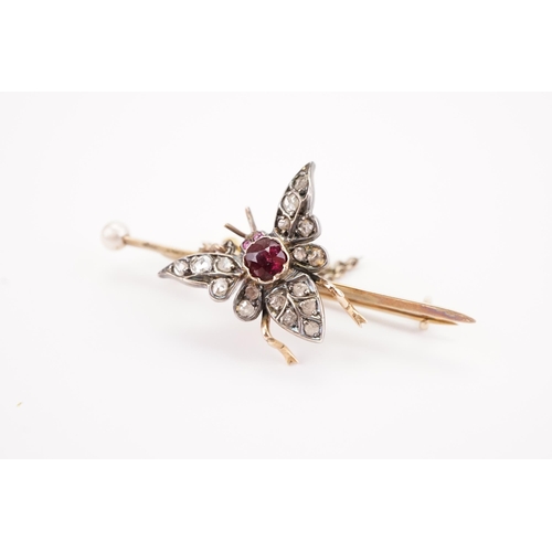 133 - A Victorian Diamond & Ruby Insect Brooch depicting a butterfly with Rose Cut Diamonds & a Circular C... 