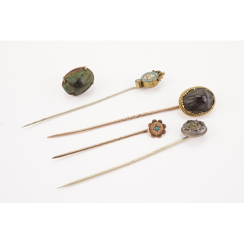 142 - A Collection of interesting Stick Pins to include Scarabs, Mosaic & Turquoise Set.