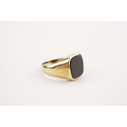 145 - A Large Onyx mounted 333 marked Signet Ring. Weighing: 7.7 grams. Size: W.