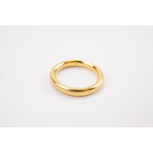 147 - A Large 22ct Gold Wedding Band. Weighing: 7.2 grams. Size: M.