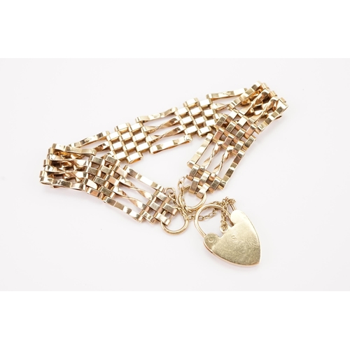 116 - A 9ct Gold Chain Linked Bracelet with Safety Chain & unmarked Love Heart Lock. Weighing: 16.8 grams.