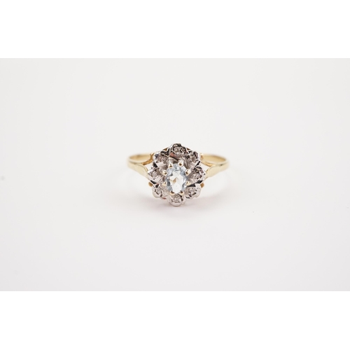 120 - A 9ct Gold Aquamarine & Diamond Set Floral Ring. Weighing: 2.1 grams. Size: R.