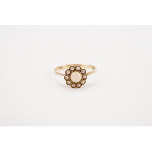 126 - An Opal & Seed Pearl Mounted 9ct Yellow Gold Ring. Weighing: 1.2 grams. Size: O.