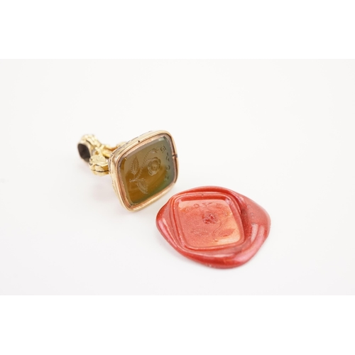 220 - A Victorian intaglio seal, mounted with a green stone depicting love & rose. Height 22mm. Weight 4.2... 