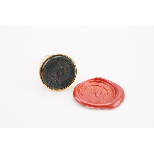 179 - A Georgian intaglio seal, mounted with a bloodstone, depicting a unicorn and the words ‘OMNIA SUFDA ... 