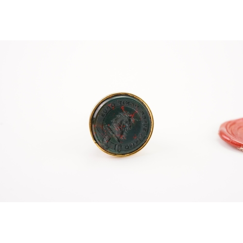 179 - A Georgian intaglio seal, mounted with a bloodstone, depicting a unicorn and the words ‘OMNIA SUFDA ... 