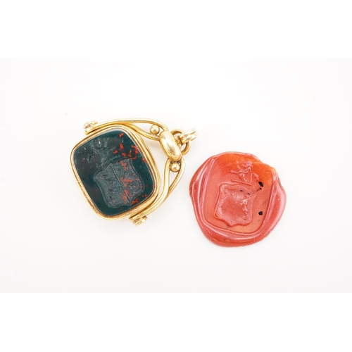 222 - A 18ct gold marked intaglio fob, mounted with a bloodstone and carnelian stone. Bloodstone depicts a... 