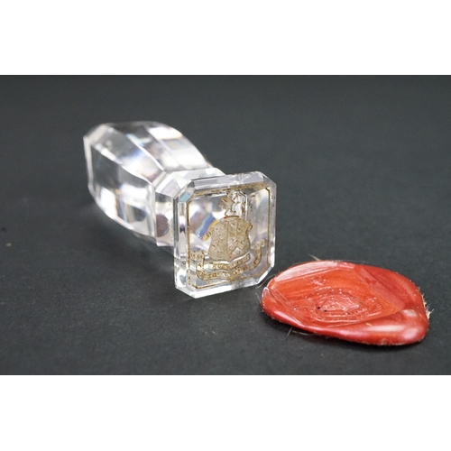 223 - A interesting Victorian rock crystal faceted edged wax seal, depicting a phoenix over shield. Height... 