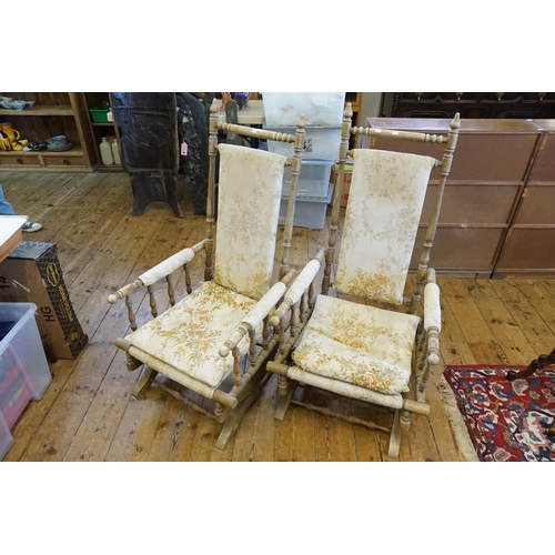 577 - A Pair of American Swing Framed Rocking Chairs with turned Bobbin Arms.