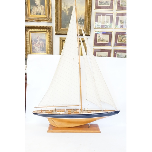 540 - A Wooden Model of a Single Mast Sailing Boat on Stand. Measuring: 92cms long x 130cms high.