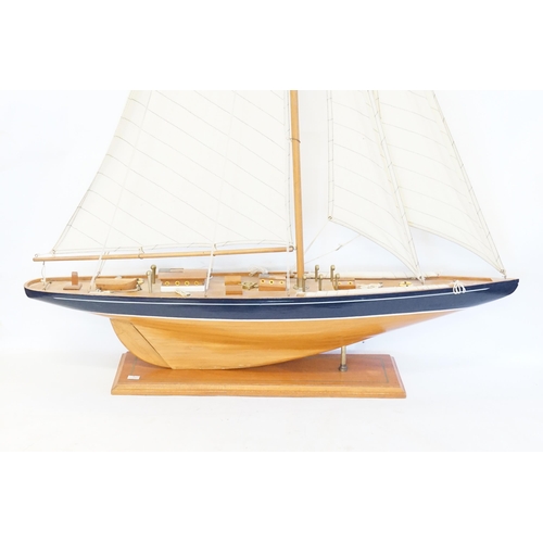 540 - A Wooden Model of a Single Mast Sailing Boat on Stand. Measuring: 92cms long x 130cms high.