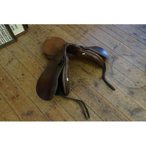 435 - A 1960s Stubben Leather Stitched & Padded Horse Riding Saddle. 16.5 inches.