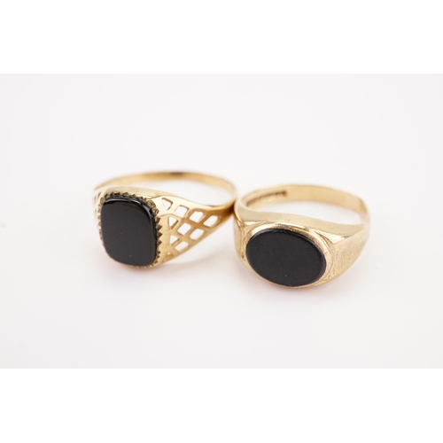 182 - Two 9ct gold onyx set signet rings. Weight 5.1g.