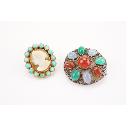 184 - A turquoise and cameo set converted brooch, along with a Scottish pebble design brooch.