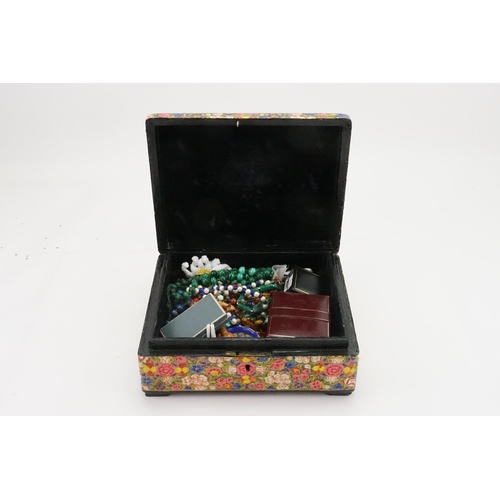 236 - A lacquered floral box containing costume jewellery, to include bead necklaces including malachite, ... 