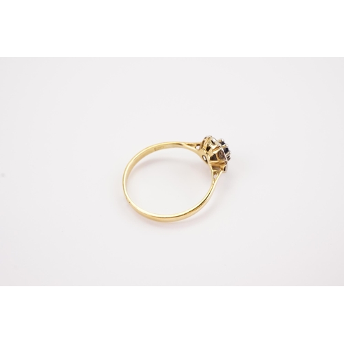 198 - A 18ct gold Sapphire and diamond set ring. Weight 2.9g. Size S.