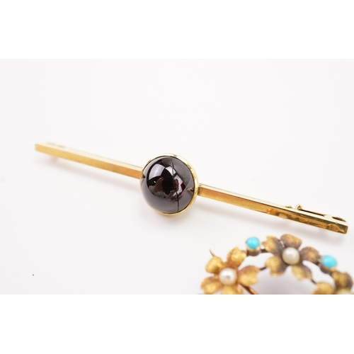 203 - A seed pearl and turquoise brooch, along with a cabochon garnet brooch. Weight 6g.