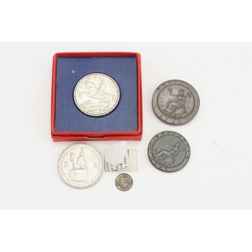 286 - A collection of coins to include a 1797 George III coin, Moroccan 1892 coin, along with other coins.