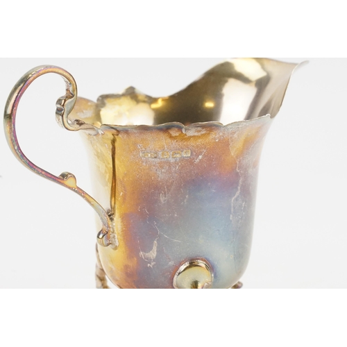 44 - A 1940's silver E S Barnsley & Co cream jug. Weight 43g.